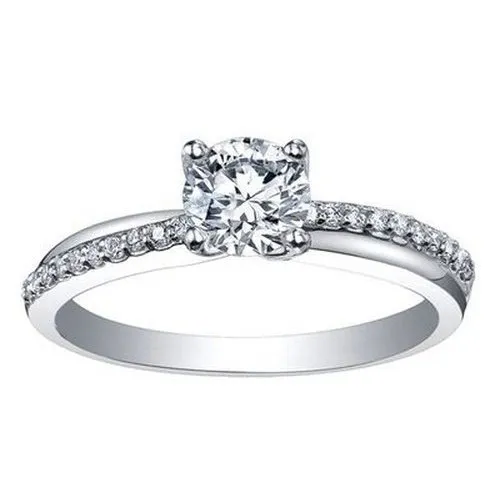 Brilliant cut solitaire with cross over shoulders .45ct