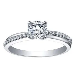 Brilliant cut solitaire with cross over shoulders .45ct