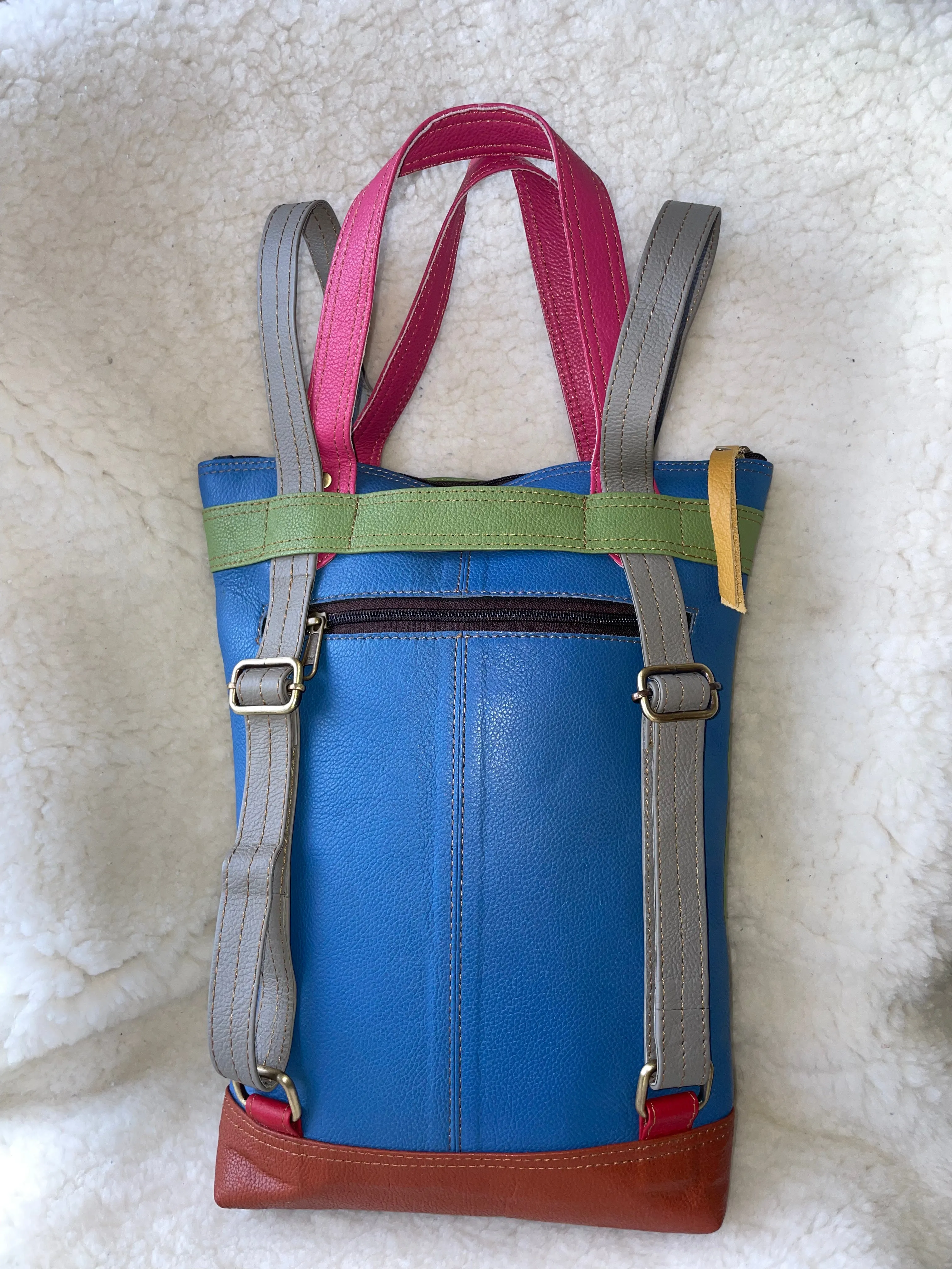 Handcrafted, Recycled Leather Backpack with Detachable Clutch.