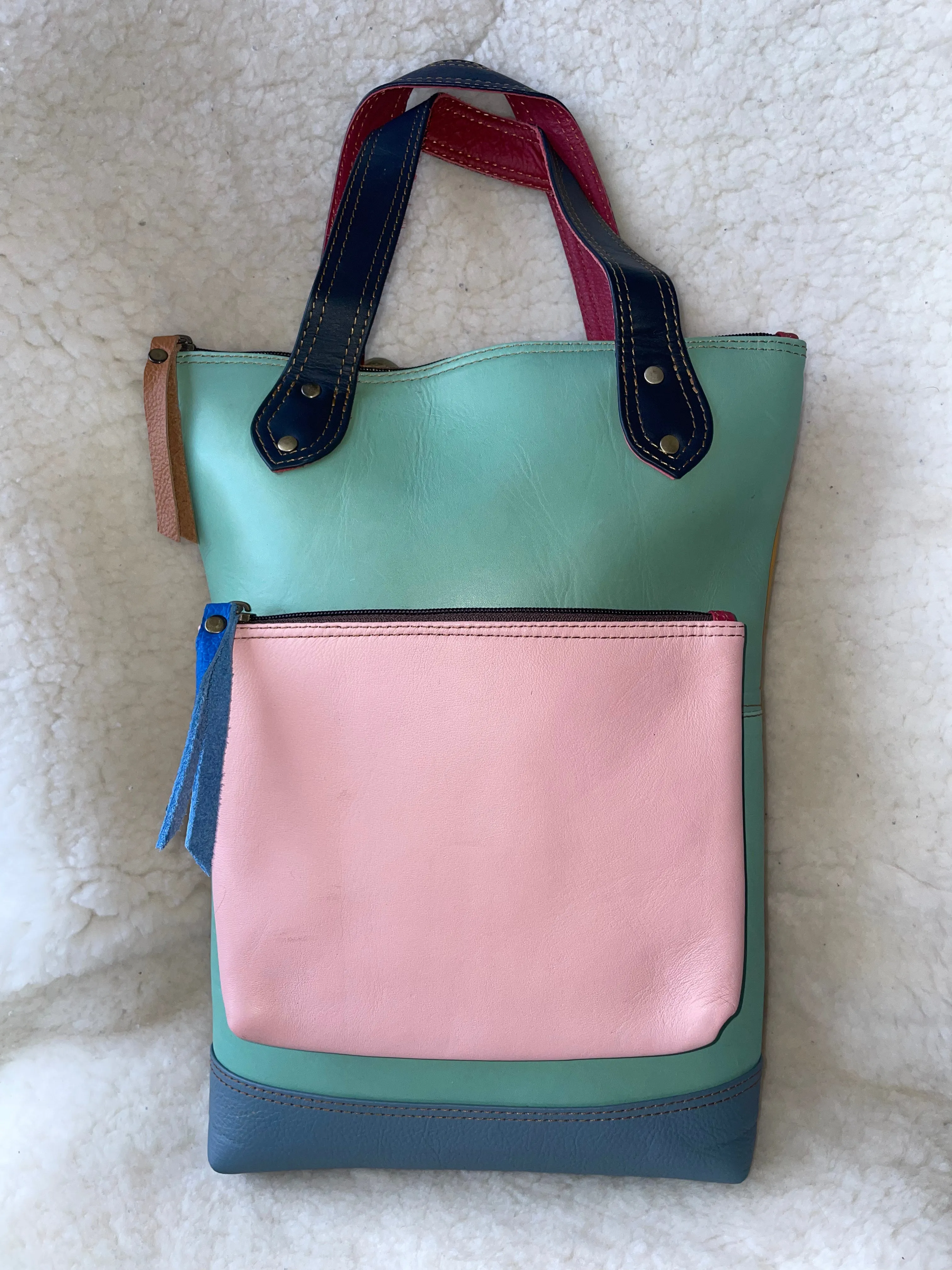 Handcrafted, Recycled Leather Backpack with Detachable Clutch.