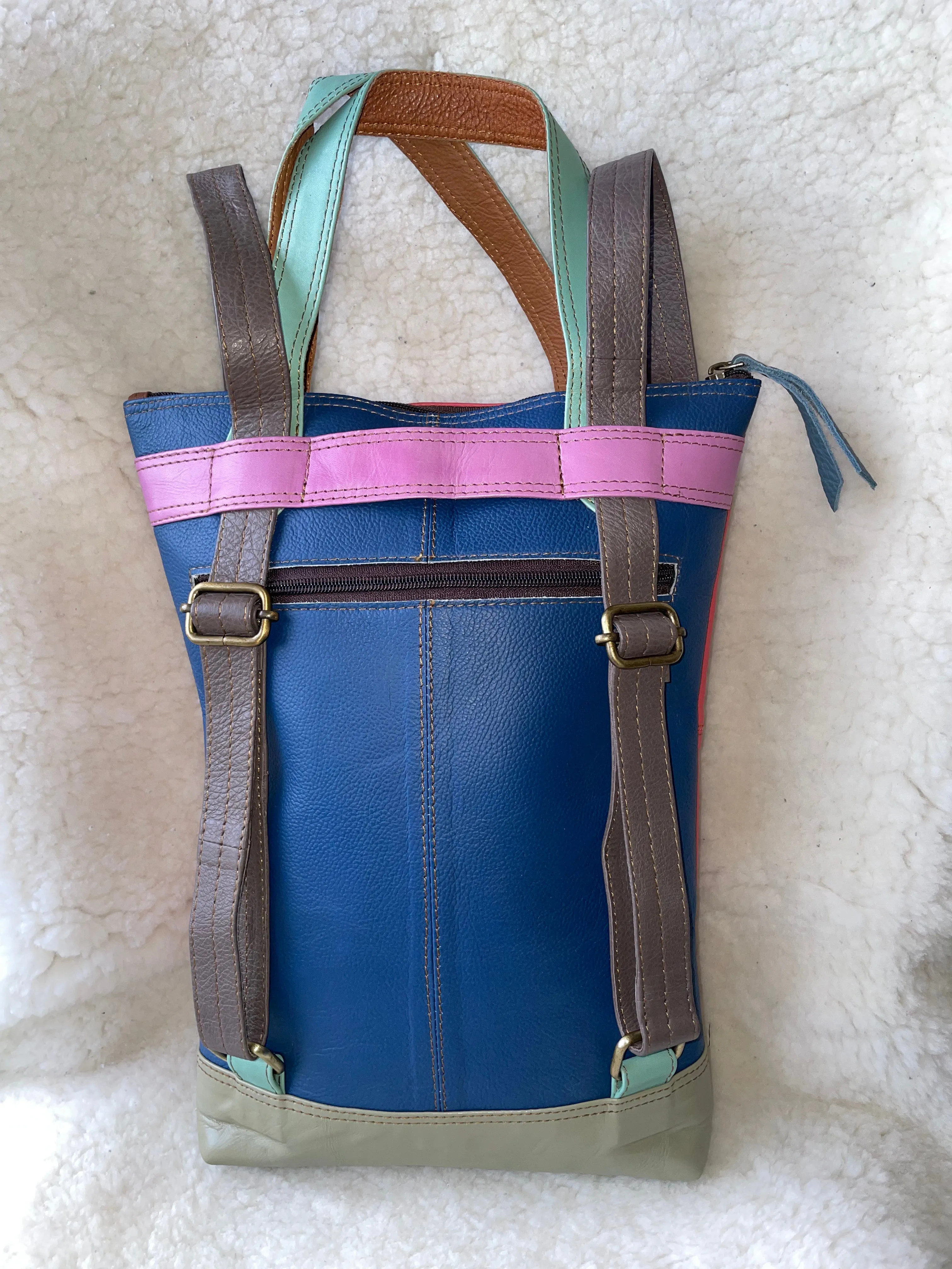 Handcrafted, Recycled Leather Backpack with Detachable Clutch.