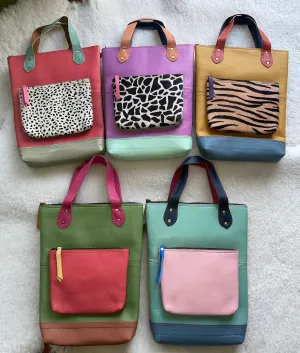 Handcrafted, Recycled Leather Backpack with Detachable Clutch.
