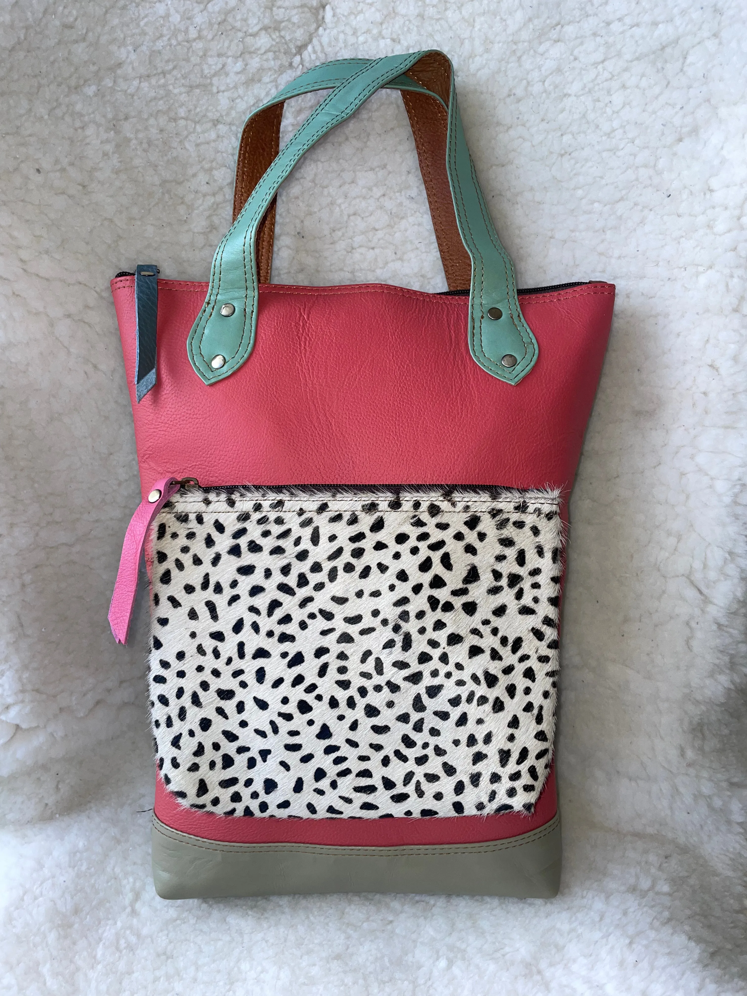 Handcrafted, Recycled Leather Backpack with Detachable Clutch.