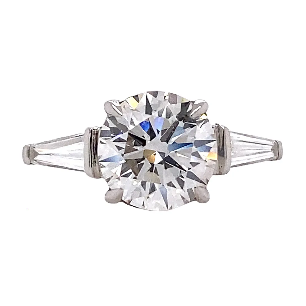 Round Brilliant Cut Diamond Ring with Tapered Baguettes