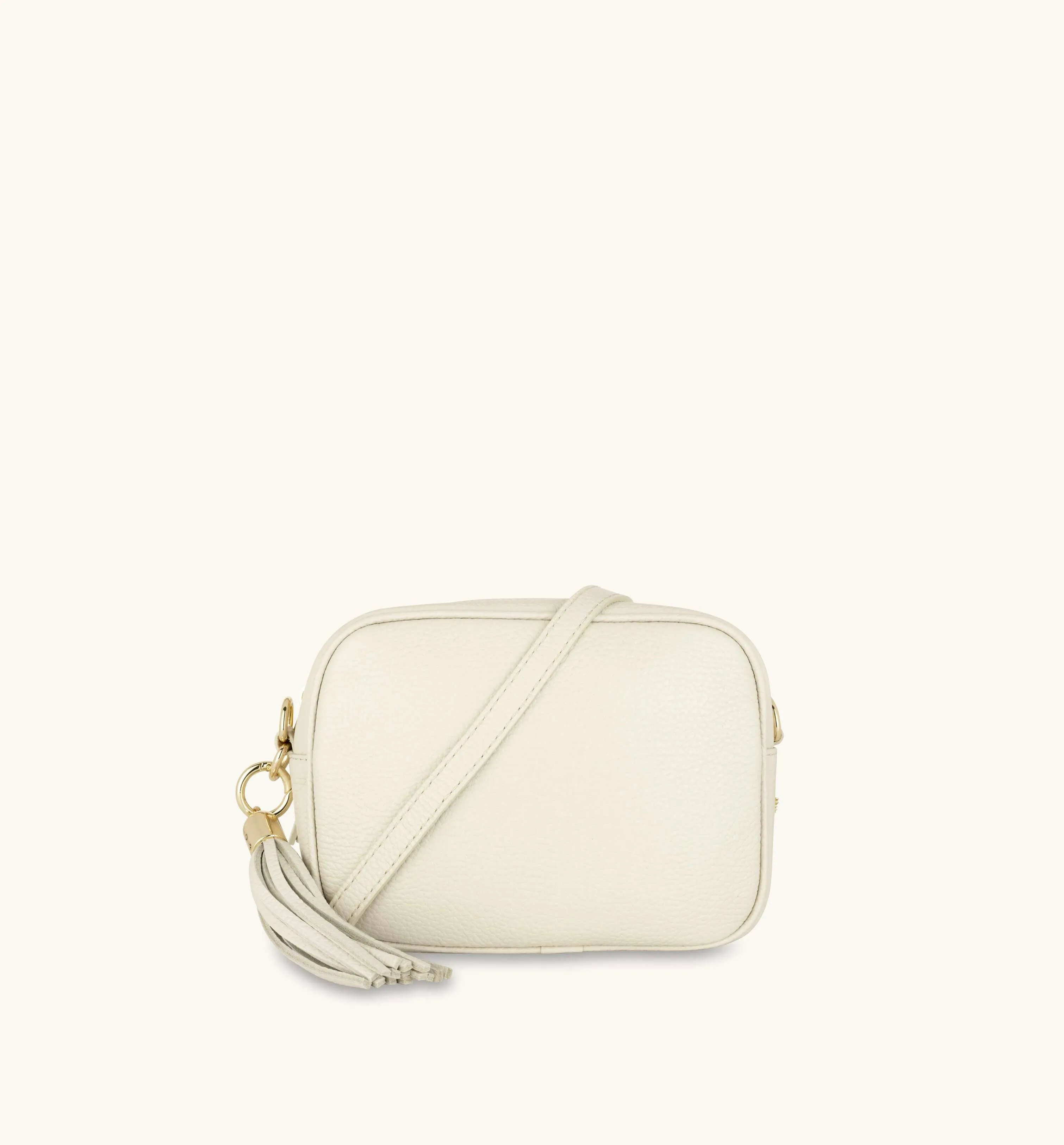 The Tassel Stone Leather Crossbody Bag With Orange Cross-Stitch Strap